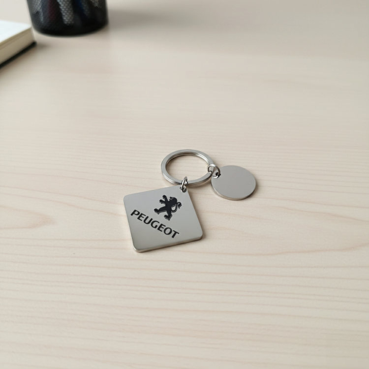 Брелок автолюбителю Peugeot m39.com.ua Брелок автолюбителю Peugeot